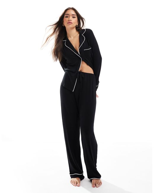 Pyjama ultra doux avec pantalon et chemise a manches longues et liseres contrastants ASOS en coloris Noir Lyst