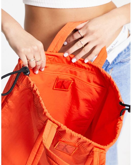 Calvin Klein City Nylon Square Tote Bag in Orange | Lyst