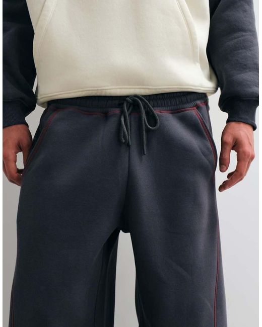 ASOS Blue Asos Desig Cocoon Fit jogger With Contrast Coverstitch Co for men