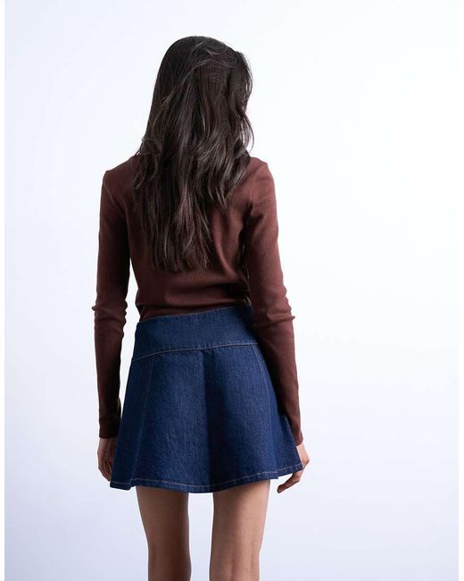 Minifalda Vaquera Azul Añil Enjuagado Con Botones De TOPSHOP de color Blue