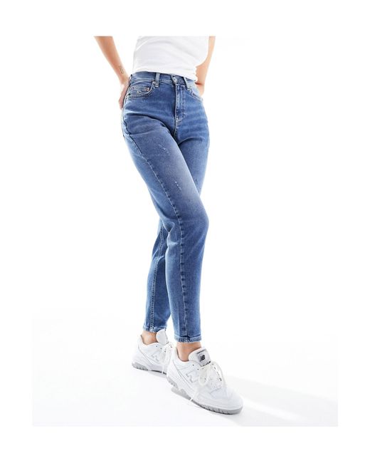 Jean mom slim à taille ultra haute - moyen délavé Tommy Hilfiger en coloris Blue