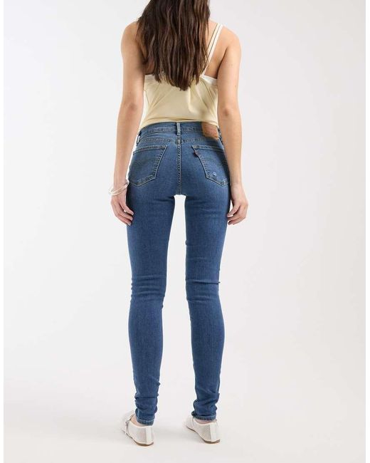 Levi's 710 Super Skinny Jeans Van Denim Met Scheuren in het Blue