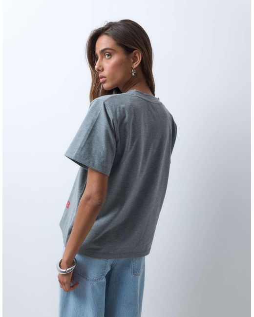 ASOS White Disney Oversized Shoulder Pad T-shirt With Mickey Mouse Varsity Print