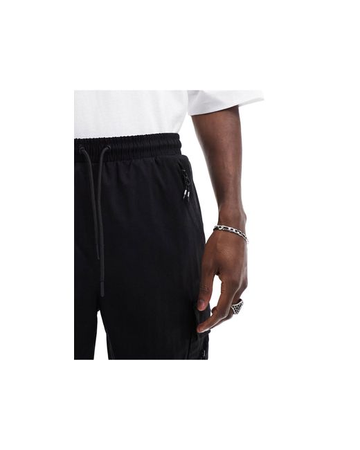 Shoreline - pantaloni cargo neri di Nicce London in Black da Uomo