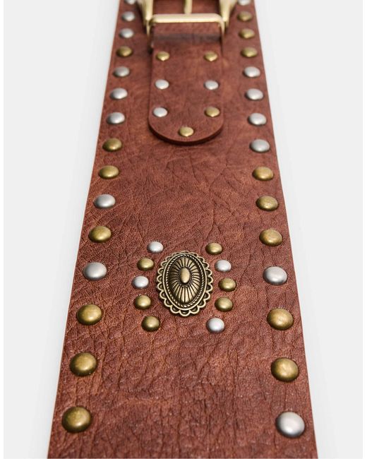Ceinture large cloutée Stradivarius en coloris Blue