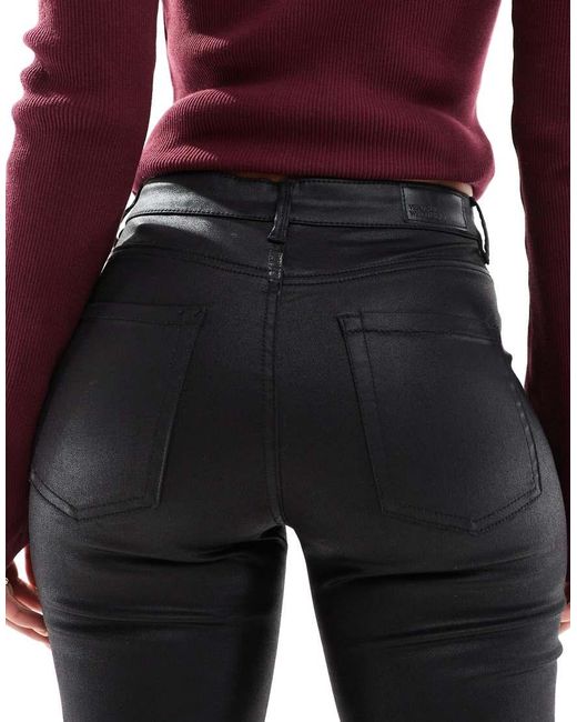 Vero Moda Black Flash Coated Kick Flare Jeans