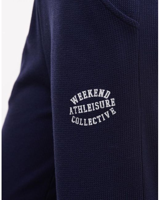 ASOS Blue Weekend Collective Waffle Wide Leg Sweatpants With Graphic