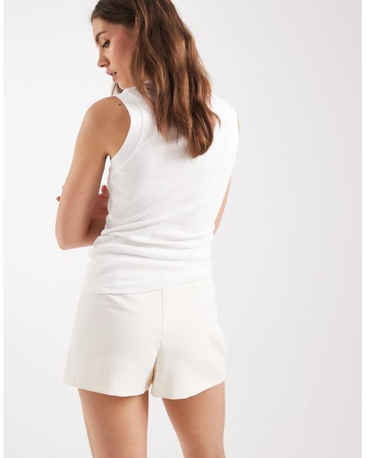 Mini jupe-short d'ensemble à basque - citron ASOS en coloris White