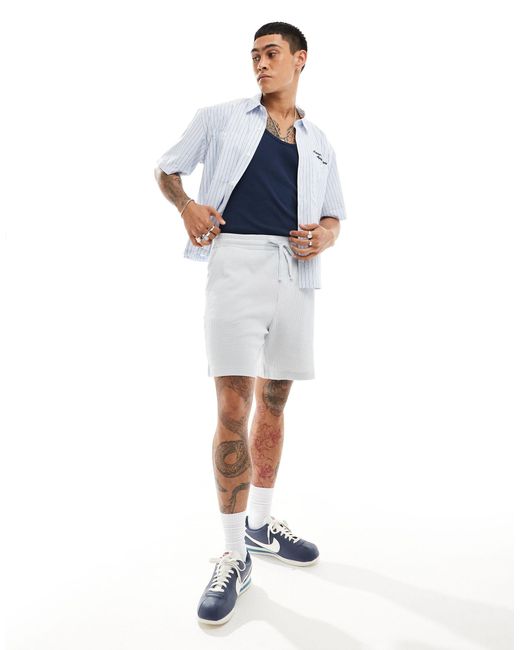 ASOS – schmal geschnittene shorts in Blue für Herren