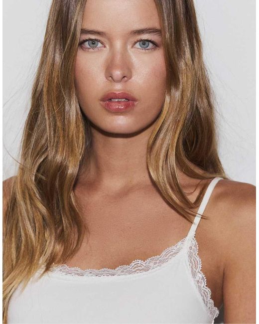 Stradivarius White Bodysuit With Blonde Lace Detail