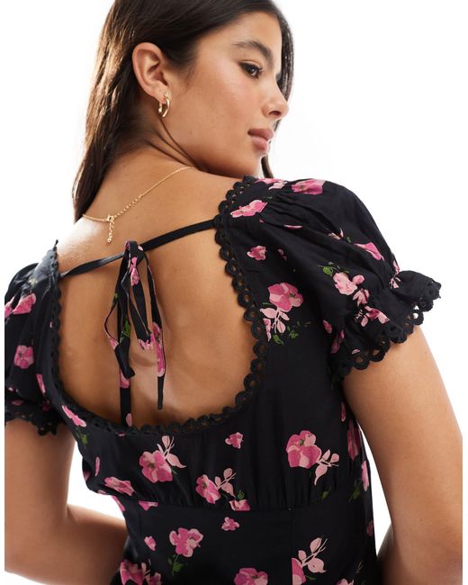 Combishort à fleurs avec taille style corset et bordures en dentelle filée - noir ASOS en coloris Blue