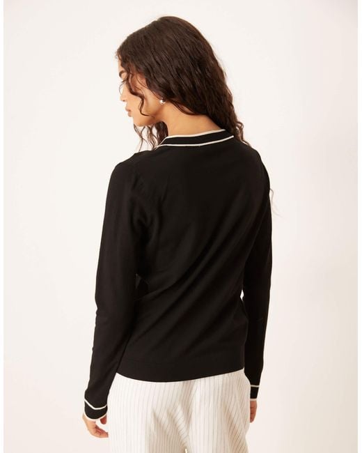 Pull en maille avec col en v et finitions contrastantes Mango en coloris Black