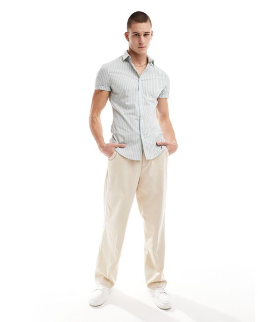 Camicia skinny chiaro a righe con maniche risvoltate di ASOS in White da Uomo