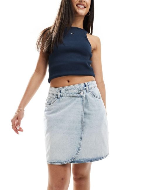 Mini-jupe short en jean - clair Vero Moda en coloris Blue