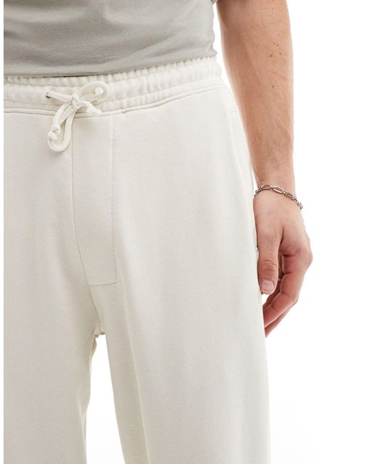 Joggers a fondo ampio color écru di Pull&Bear in White da Uomo