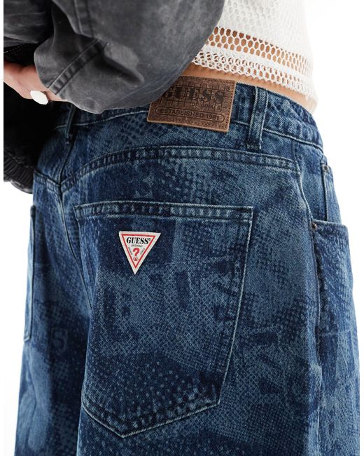 Jeans a fondo ampio unisex con stampa laser di Guess in Blue