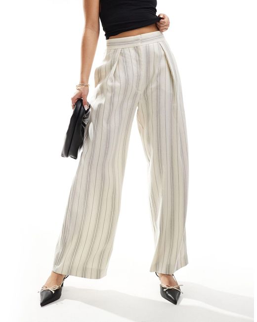 Pantaloni color crema a righe a fondo ampio di River Island in White