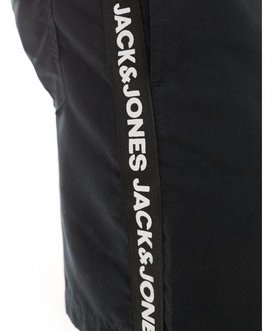Pantaloncini da bagno neri con finiture con logo di Jack & Jones in White da Uomo
