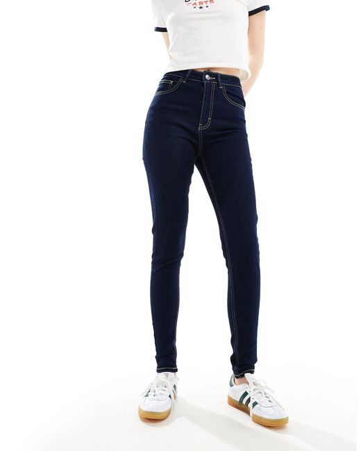 Jeans skinny a vita alta lavaggio scuro di Pimkie in Blue