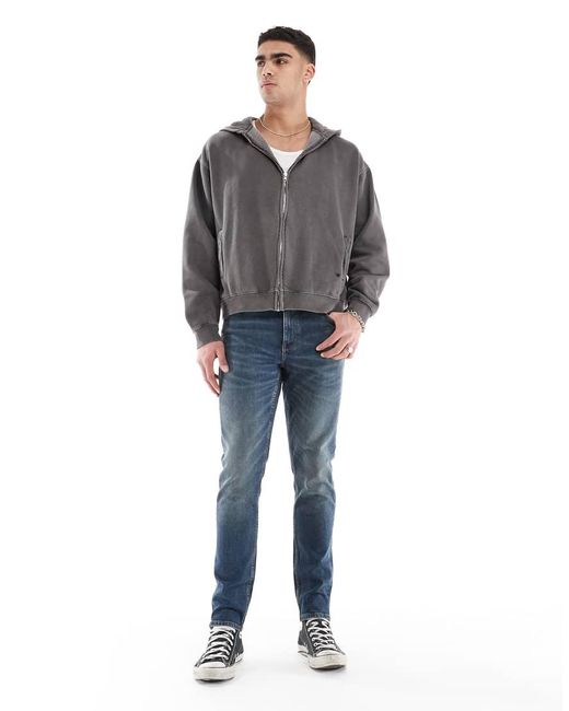 Vaqueros Ajustados En De ASOS de hombre de color Blue