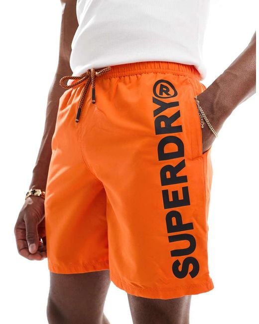 Superdry Orange Sport Graphic 17-Inch Swim Shorts for men