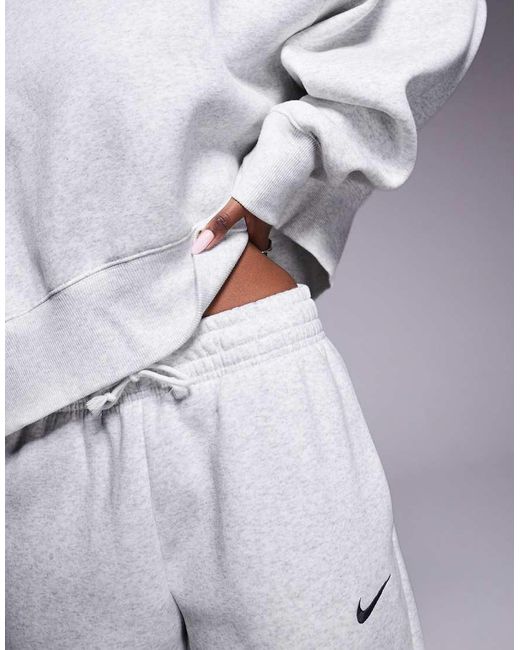 Joggers Grises Extragrandes De Talle Alto Phoenix Fleece De Nike de color Blue