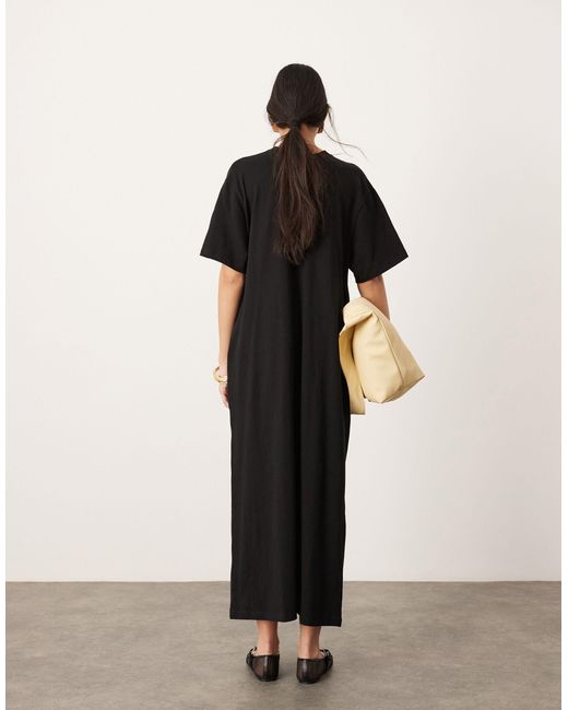 Premium - robe t-shirt longue à poches - noir ASOS en coloris Natural