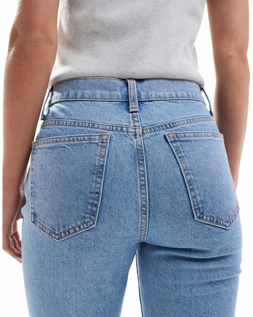 Asos design petite - jean évasé à taille mi-haute - pâle délavé ASOS en coloris Blue