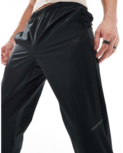 New Balance Black Tenacity Stretch Woven Pant for men