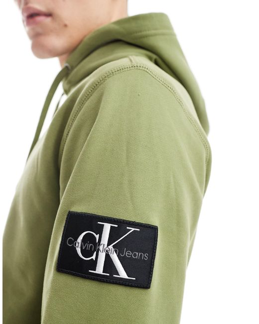 Felpa color ginepro con cappuccio e logo applicato di Calvin Klein in Green da Uomo