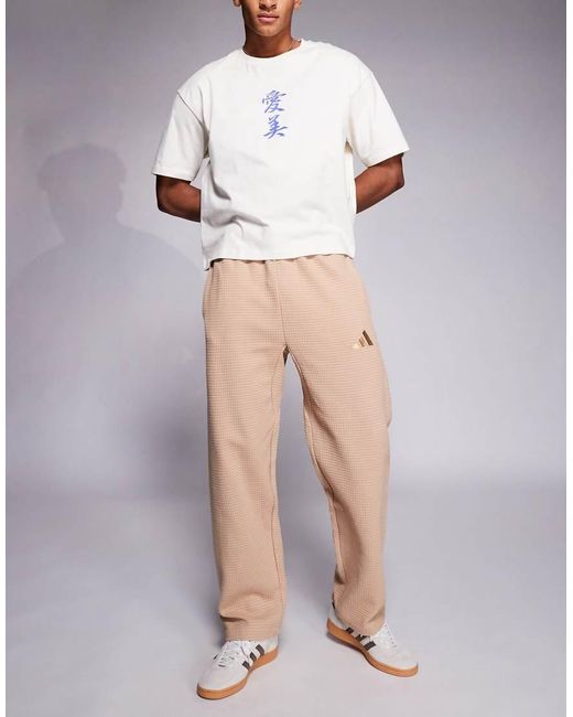 Adidas Originals Purple Adidas Sportswear Waffle Track Pants for men