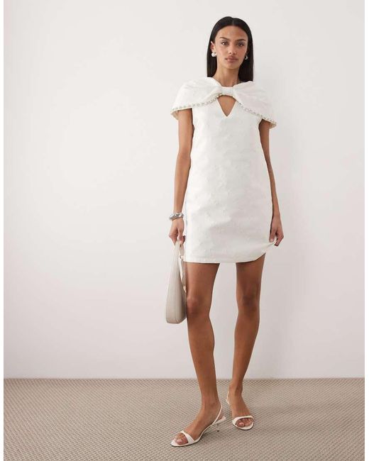 Sister Jane White Bridal Detachable Cape Detail Pearl Embellished Mini Dress