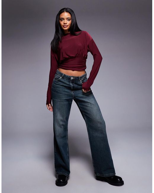 Top asymétrique près du corps à manches longues et taille cintrée - bordeaux ASOS en coloris Purple