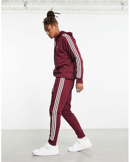 Adicolor - felpa con cappuccio bordeaux con 3 strisce da Uomo di adidas  Originals in Rosso | Lyst