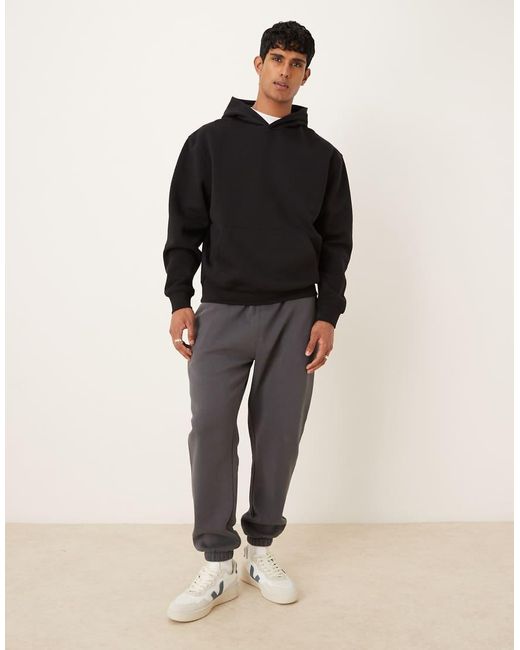ASOS Black Essentials Relaxed Fit Hoodie for men
