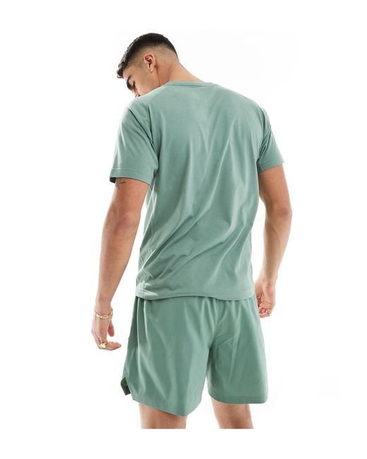 PUMA Running – evolve – shorts aus webstoff in Green für Herren