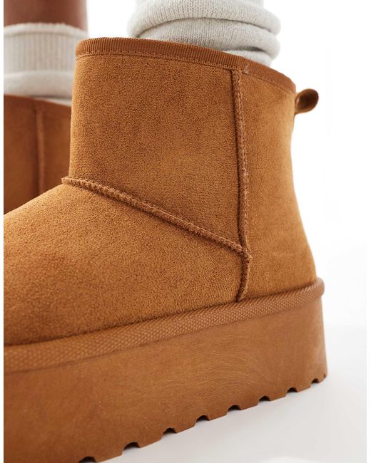 SEQWL White Flatform Boots