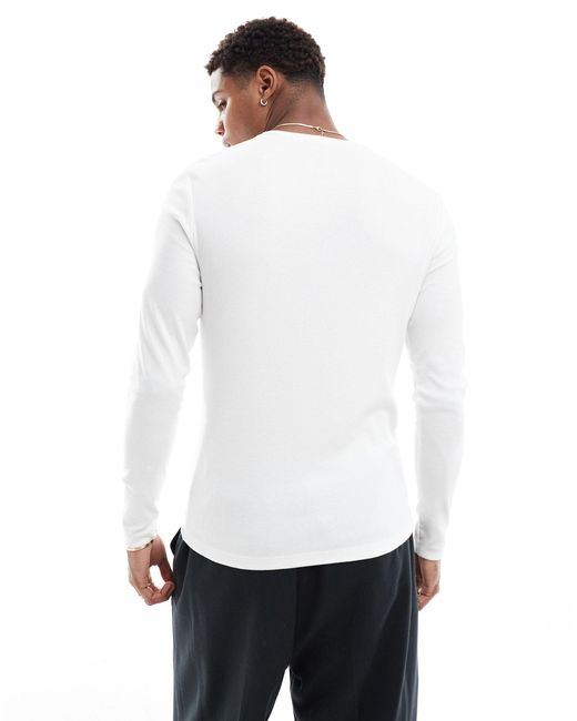 T-shirt attillata a maniche lunghe bianca a coste di ASOS in White da Uomo
