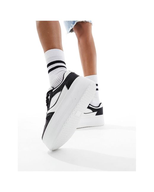 Sneakers flatform a pannelli bianche e nere di London Rebel in Blue