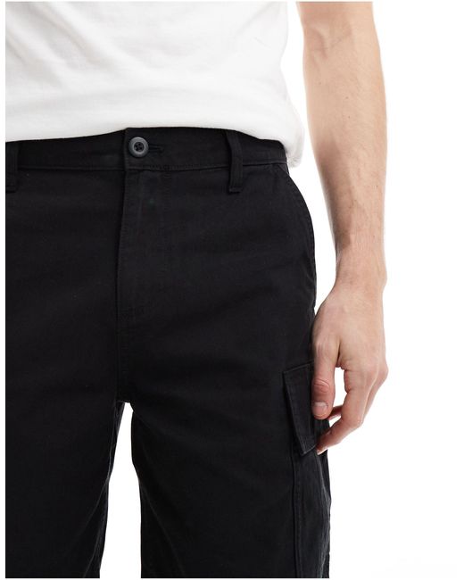 Pantaloncini cargo ampi neri di ASOS in Black da Uomo