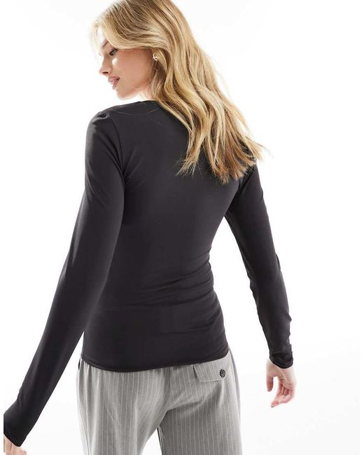 Top Reversible De Manga Larga Sin Costuras De ONLY de color Black