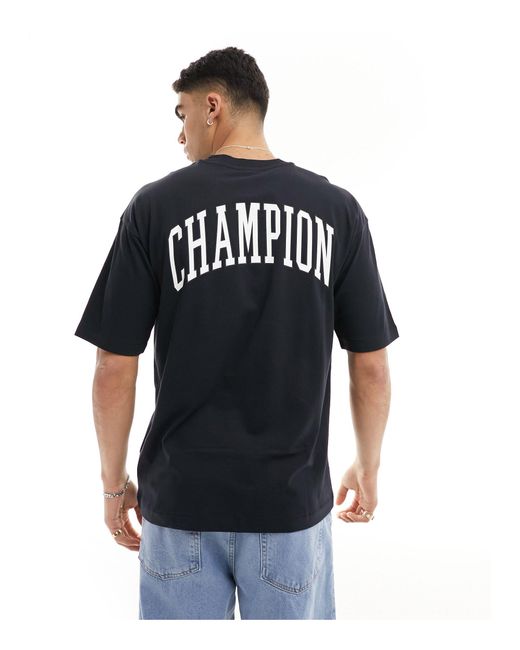 Camiseta negra con logo estampado en la espalda Champion de hombre de color Black