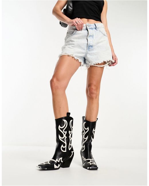Starrie - bottes style western avec détails métalliques - et blanc Public Desire en coloris Black