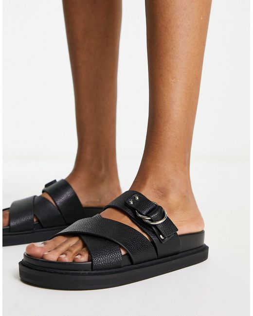 Schuh Tamara Cross Strap Flat Sandals in Black | Lyst