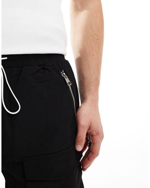 Pantaloncini cargo neri con pannelli a contrasto di The Couture Club in Black da Uomo