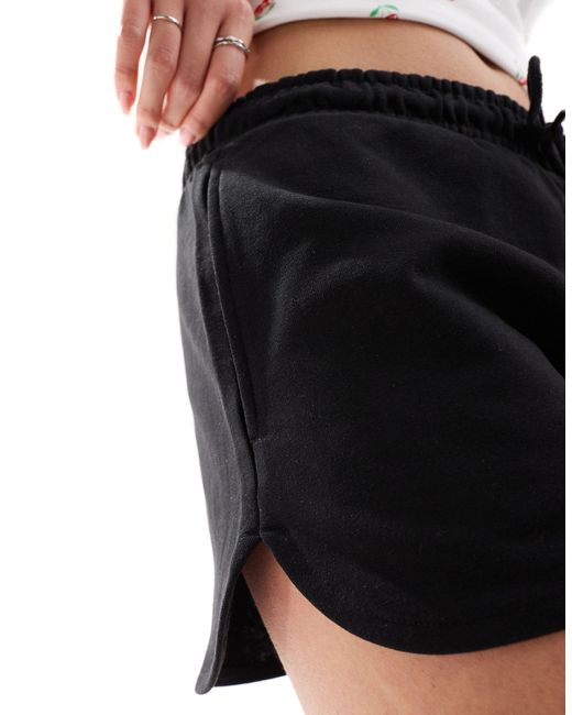 Monki Black Heavy Jersey Shorts With Curved Hem