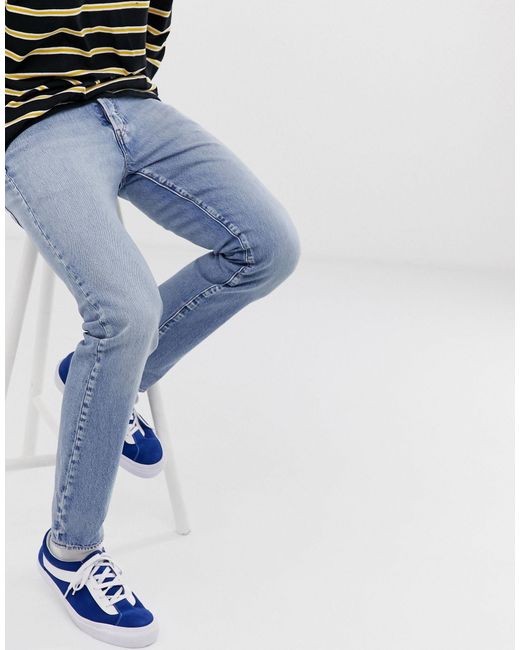 levi's 501 slim taper jeans