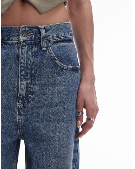 TOPSHOP Blue High Rise baggy Jeans With Mud Marks