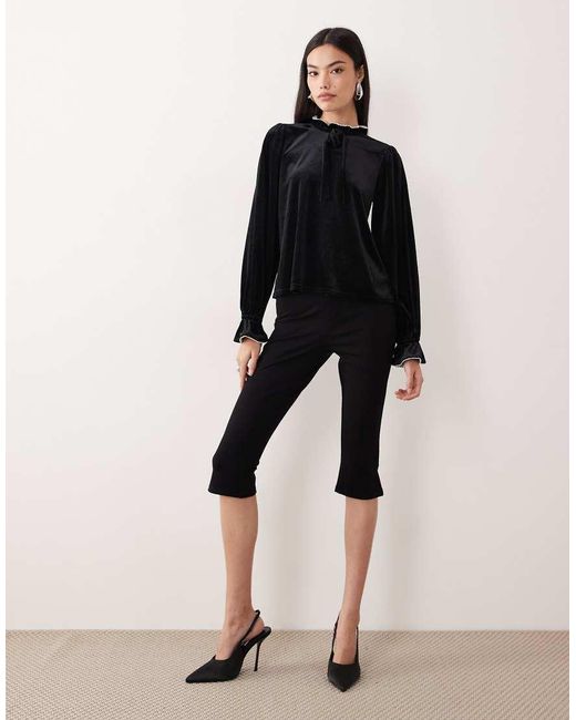 Nobody's Child Black Ruffle High Neck Blouse