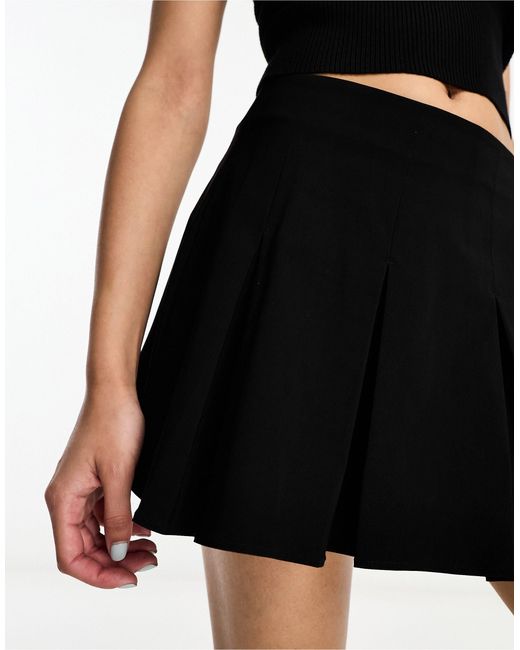 Mini-jupe ultra courte à plis creux ASOS en coloris Noir | Lyst